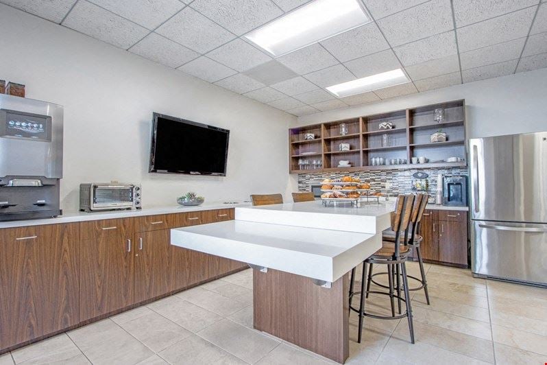 23C - 23 Corporate Plaza Dr.